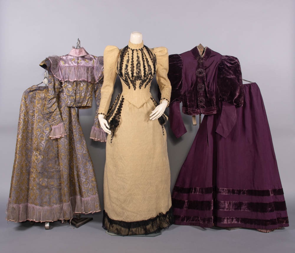 THREE DAY OR AFTERNOON DRESSES, 1890-1897: 2-pc afternoon dress of Italian Renaissance patterned silk w/ silk moire collar, epaulet SH puffs & silk chiffon yoke & cuffs, 1897, poor-fair; 1 day dress of light brown raised patterned wool in tuli