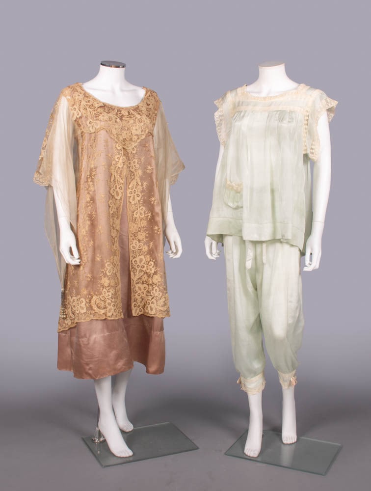 BOBBIN LACE EVENING DRESS & SILK CREPE PAJAMAS, 1925-1929: 1 mauve silk satin evening dress overlaid w/ bobbin lace & chain stitch on tulle, w/ gauze hanging sleeve terminating in crystal glass bead & pearl tassel, 1929, B 36”, L 46”, (0.25”