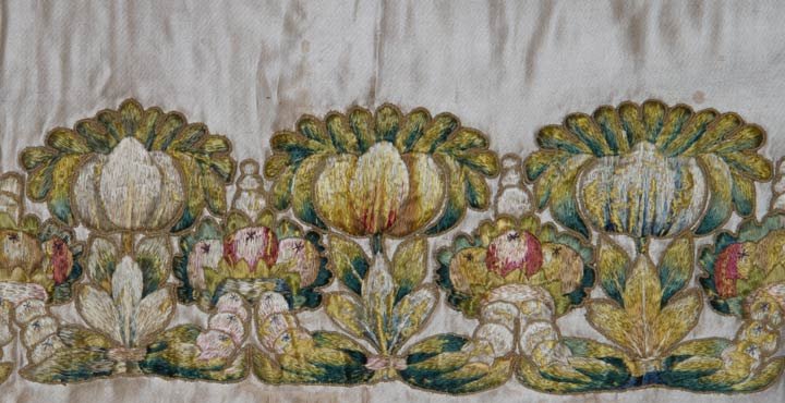 EMBROIDERED ALTAR FRONTAL, EUROPE, 18TH C: Beige satin long panel, polychrome embroidered appliques of elaborate dimensional fruit & flowers, wool batting, 24" x 164", (missing backing, satin dirty & splitting) satin poor condition, embroidere