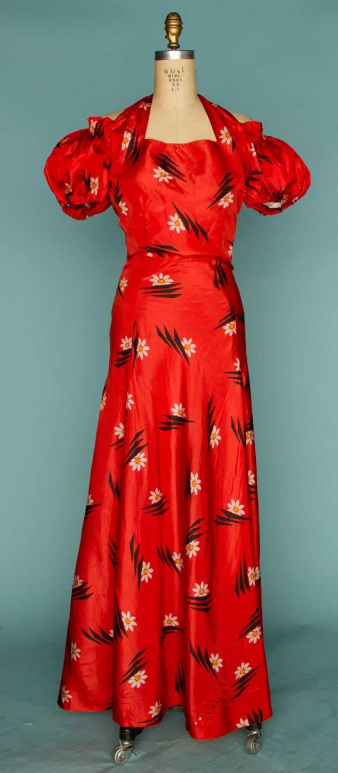 BOUE SOEURS SUMMER GOWN, 1930s: Labeled, red silk taffeta, black & white floral print, short off-shoulder sleeves, 2 front panels tie back of neck to form halter, B 37", W 28", L 63.5", (small fabric pulls at seams, elastic stretche