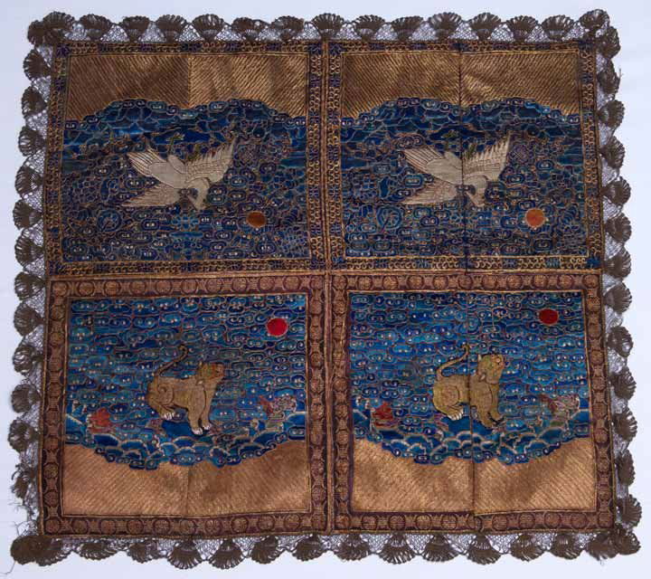 FOUR CHINESE RANK BADGES, EARLY 19TH C: 2 complete pairs, the 4 badges sewn together to form a single mat trimmed w/ gold lace, both pair w/ red sun, the small ground motifs embroidered in shades of blue, outlines of all elements outlined i