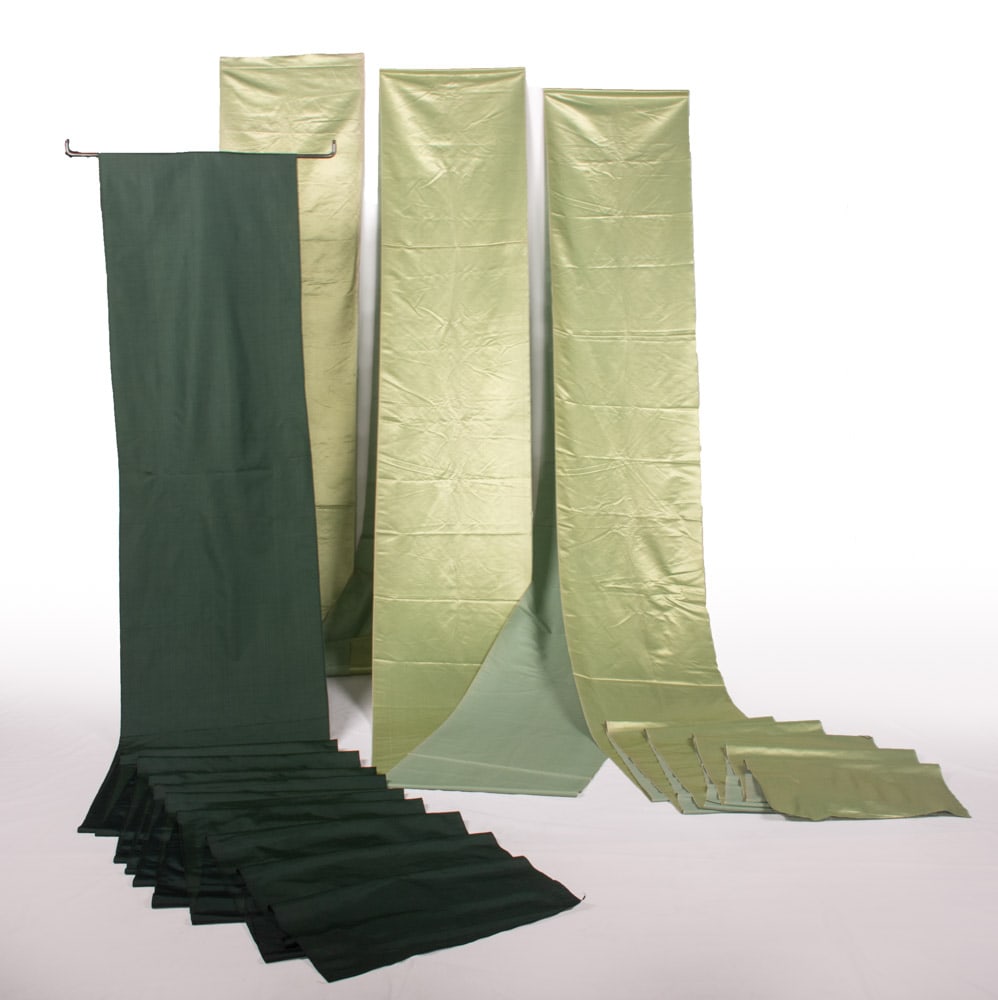 SILK SATIN & OTTOMAN YARDAGE, LATE 19th- EARLY 20th C: 1 chinoiserie green silk satin yardage, 18.75” x 700”, (few tiny-2” light stains, broad light foxing/discoloration to underside) Very Good; 1 forest green silk ottoman yardage, 21.25