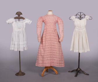 THREE COTTON CHILDREN’S DRESSES, 1820-1850s