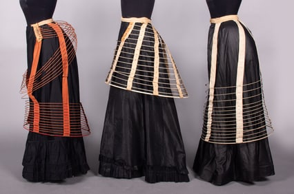 THREE CAGE CRINOLINES, 1875-1885