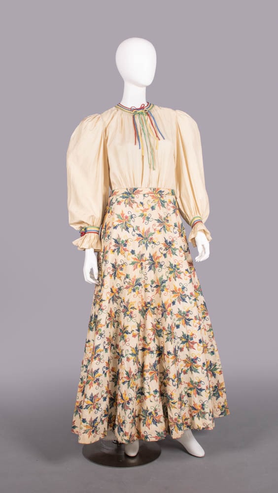 GLORIA VANDERBILT WORN HOUSE OF TAPPE’ PARTY DRESS, NEW YORK, 1940s: Embroidered cotton fancy dress costume w/ flat bias bands applied to collar & cuff, label “House of Tappe’, New York”, B 40”, W 30”, L 58”, (few tiny-1” very light st