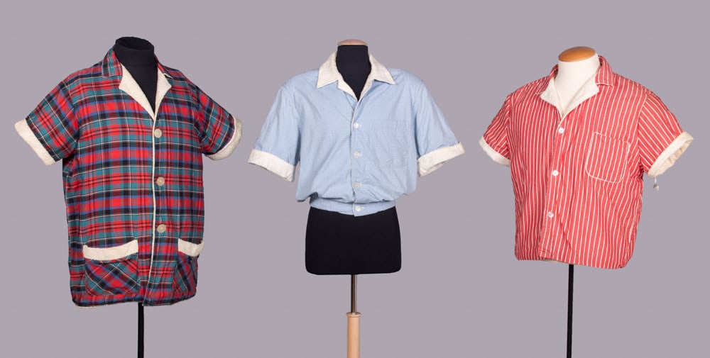THREE TERRY CLOTH & COTTON CABANA SHIRTS, USA, 1950s: All cotton w/ white terry cloth lining: 1 plaid w/ patch pockets & button closure, label “Harcourt”, CH 46”, L 32”, (light discoloration & wear to terry) Good; 1 powder blue w/ wov