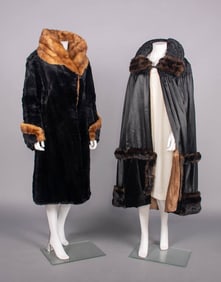 ONE SHEARED BEAVER COAT & ONE BLACK SILK SATIN EVENING CAPE, LATE 1910-1930