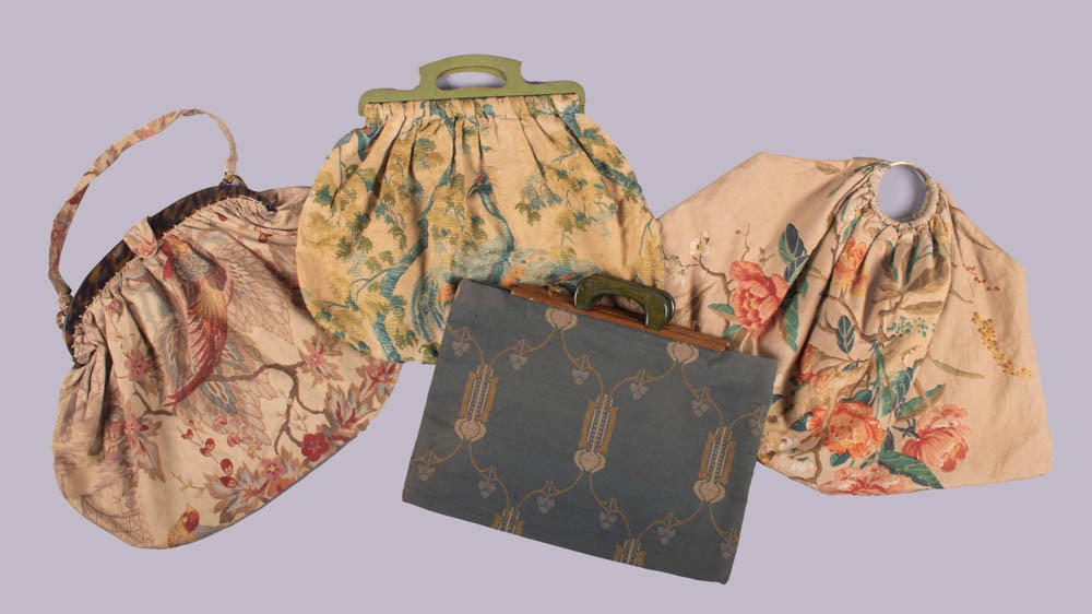 FOUR COTTON KNITTING BAGS, 1910-1920s: 1 pheasant & floral motif printed on cotton duck w/ faux tortoiseshell handle, 23” x 15”, (light discoloration, few 0.5”-1” tears at base, light scratching to frame); 1 gelatin