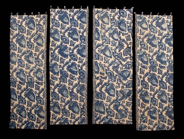 TWO SETS OF INDIGO RESIST PRINTED LINEN CURTAINS, ORIGINALLY 18TH C