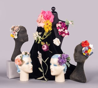 GENEROUS LOT OF CLOTH OR WOOD FIBER FLOWERS, 1930-1960s