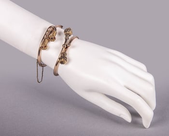 TWO ETRUSCAN REVIVAL BYPASS BRACELETS, 1860-1880