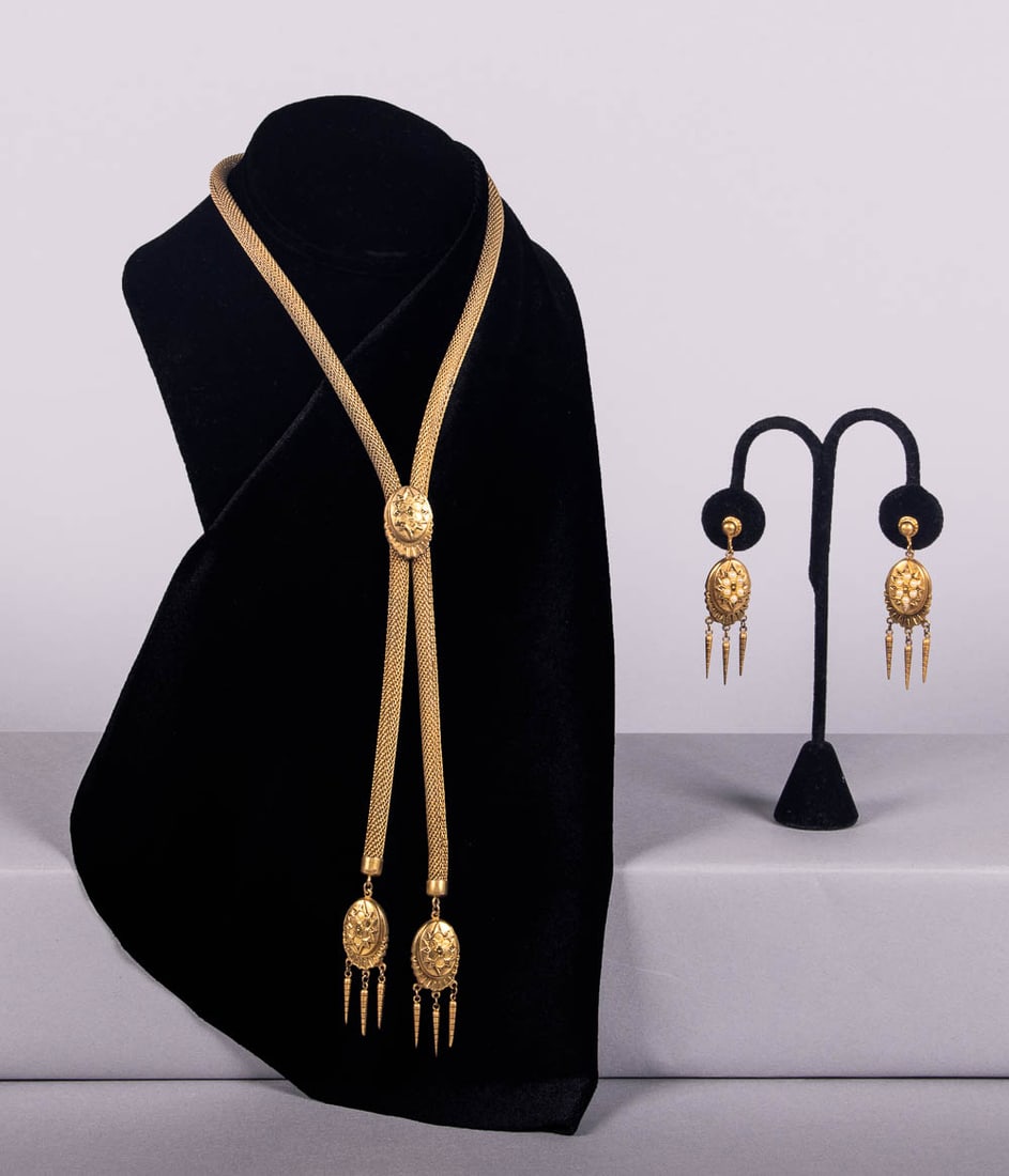 ETRUSCAN REVIVAL DEMI-PARURE, LATE 19TH C: 3-pc set c/o pair of screw-back earrings 0.75” x 2”, 16 g, (wear & light scratching, esp. reverse, minor tarnish) & 1 lariat necklace w/ slide, 2” x 27”, 56 g, (few tiny breaks