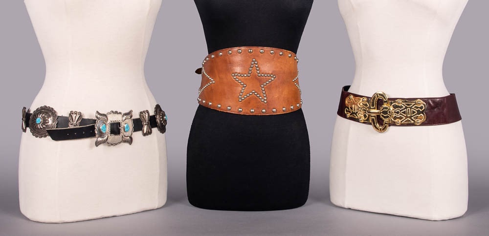 NAVAJO & SOUTHWEST STYLE BELTS, USA, LATE 20TH C: 1 brown leather w/ Southwest cast metal buckle & elastic, label “Escada”, 2.25” x 30”, (wear, minor scuffs/tarnish/residue to buckle, sm marks & tiny-2.5” scratches leather);
