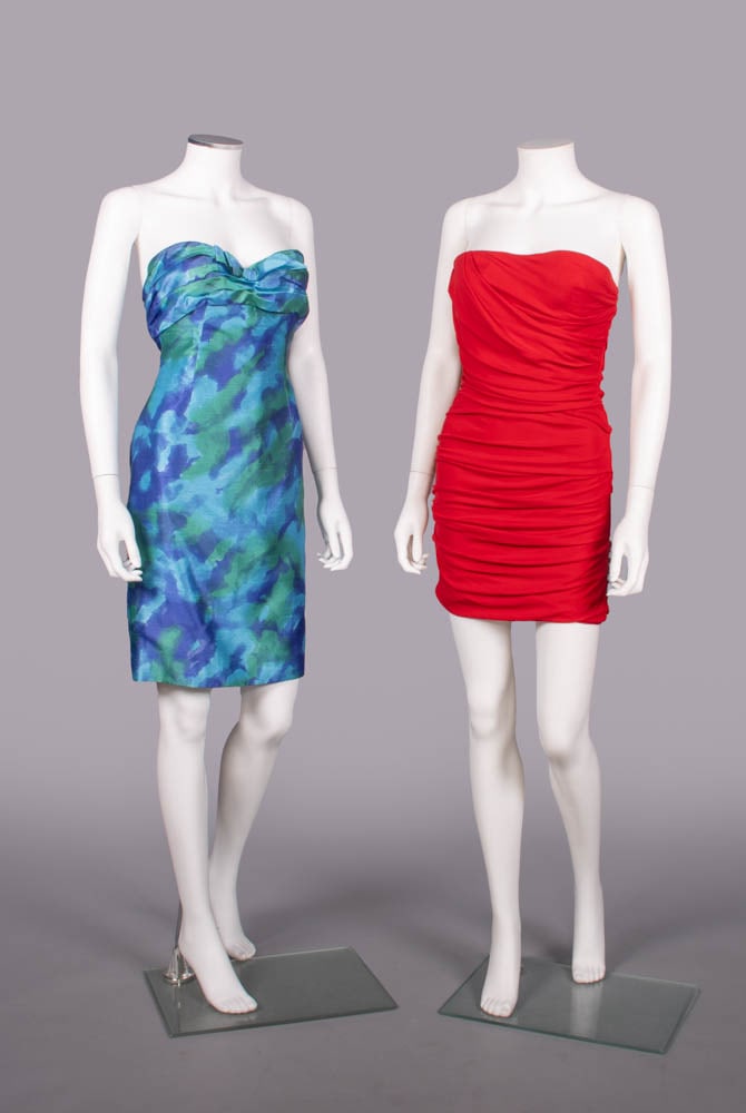 DOLCE & GABBANA & LORIS AZZARO MINI DRESSES, ITALY & FRANCE, 1980s & 2000s: 1 blue & green painted silk strapless mini dress w/ flat bow to CF of gathered neckline, label "Loris Azzaro, Paris", B 34", W 28", CFL 28", (light wear, minor discoloration lining hem, 1 hanger loop