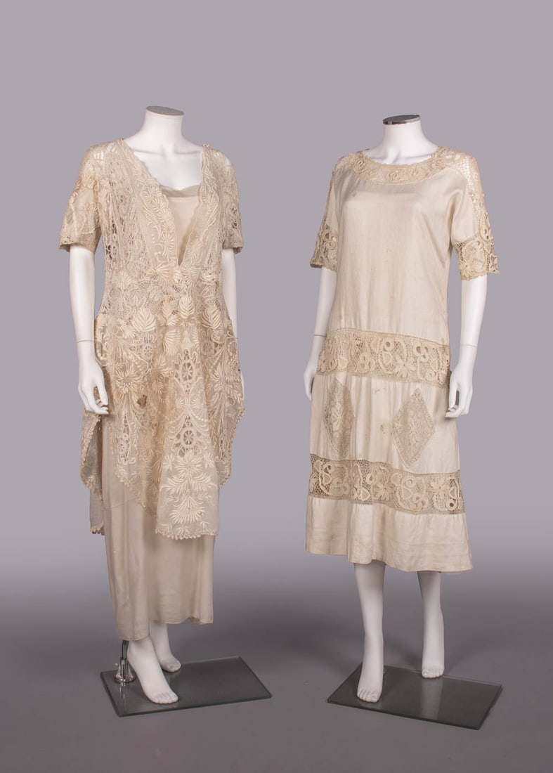 TWO EMBROIDERED & LACE LINGERIE DRESSES, LATE 1910-EARLY 1920s: 1 cotton lawn overdress w/ V-neckline, bobbin & maltese lace insertions, heavy padded embroidery, late 1910s, B 38", W 34", L 42", (broad discoloration w/ spot stains up to 1.5”, strain & severa