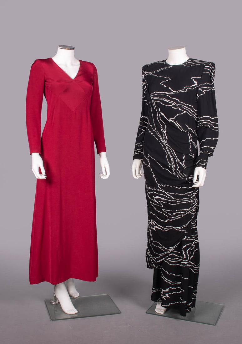 OSCAR DE LA RENTA & BILL BLASS EVENING DRESSES, USA, 1980-2000s: 1 claret silk crepe maxi dress w/ V neckline & long sleeves, label "Oscar de la Renta", B 33", W 28", L 54", (hem taken up, few 0.25"-0.5" light stains, light discoloration CB hem); 1 black silk crepe