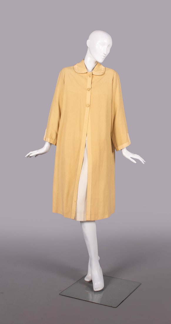 MINGOLINI GUGENHEIM SILK COAT, ROME, EARLY 1960s: Wheat colored raw silk coat, grosgrain ribbon edging collar, cuffs & CF, white silk organza lining, early 1960s, label "Mingolini Gugenheim, Roma", B 40", L 42", (slip N/I, few scattered tiny-0.25" li