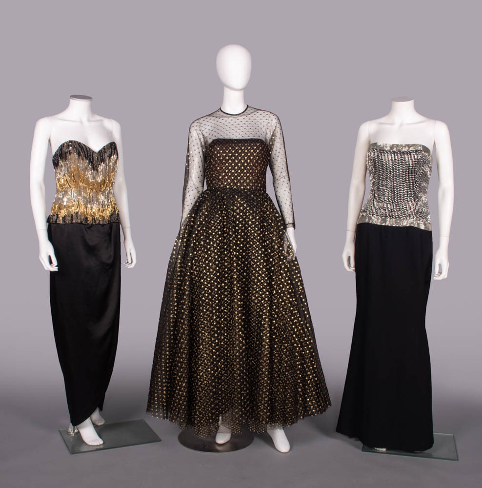 THREE BEADED OR LAME' TULLE EVENING GOWNS, 1980s: 1 black silk shantung w/ strapless bodice encrusted in black & gold bugle beads, black, gold & silver sequins on gold lame' ground, lined w/ silk chiffon, label "Ann Lawrence", B 34", W 26", CFL 50",