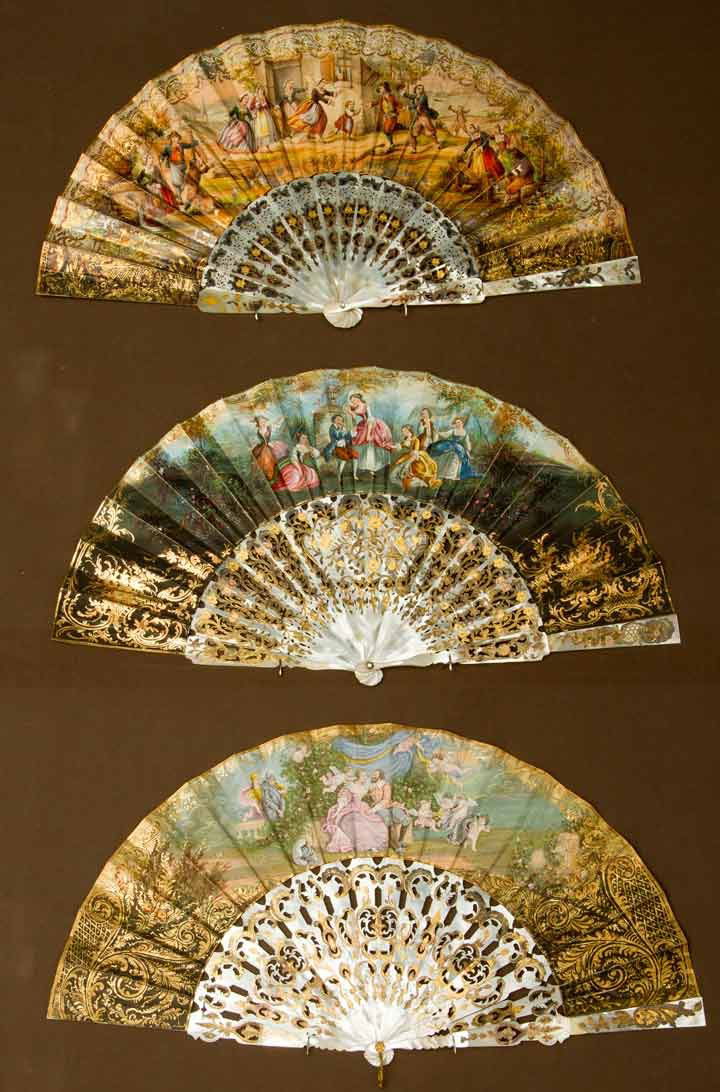 THREE GILT & PAPER FANS, MID 19TH C: All w/ painted paper leafs & abalone sticks & guards, fair-very good. BM