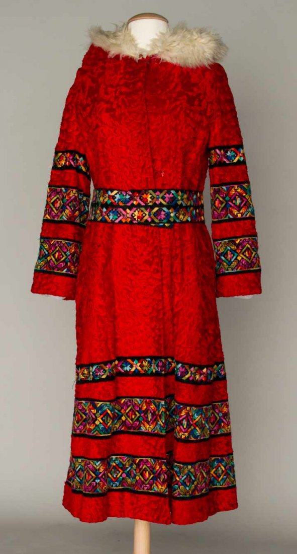 SANT ANGELO RED FUR COAT, 1965-1975: Dyed broadtail coat & hood, hood lined in white faux fur, multicolor embroidered black velvet bands & belt, 2 side pockets, "Sant' Angelo" & "Roberts Furs Boston" labels, B 34", L 44", (missing hook e