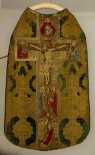 EMBROIDERED CHASUBLE, ITALY, 1450-1475: Green Venetian velvet cut to metallic gold, CF panel w/ gold & silk embroidered figures, CB panel of Christ on the cross & figures of disciples surrounding him, (fabric wear, breaks, tears, silk embro