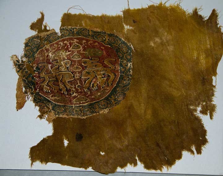 FOUR COPTIC WEAVINGS, 3RD-4TH C: Small woven fragments w/ figural iconography in brown & black, 1 w/ red; t/w 1 ancient knit band & 2 18th C cut velvet fragments; as is.