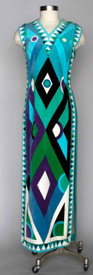 PUCCI VELVET BEACH COVER, 1970s: Velvet toweling w/ geometric print in green, purple, aqua, & black, different pattern front & back, V neck, straight lines w/ open sides, label "Emilio Pucci Florence Italy", B 34", L 55", excellent. 