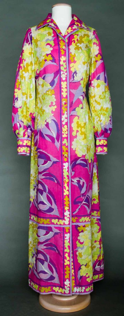 PUCCI COTTON BEACH ROBE, 1970s: Printed in shades of purple, pink, yellow & green, shirt collar, floor length w/ CF button opening, label "Emilio Pucci Florence Italy", B 34", L 52.5", excellent. Provenance: Mme. Erna de Paz, Argent