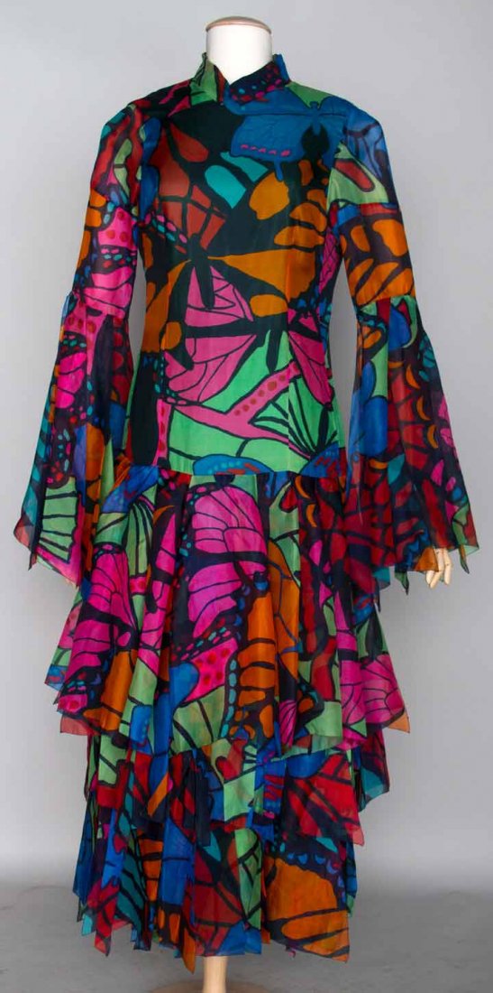 PIERRE CARDIN BUTTERFLY PRINT DRESS, 1970-1973: Fine cotton voile w/ large scale abstract butterfly print, unlabeled, high band collar, short skirt covered w/ many layers of floating panels, separate neck scarf, unlabeled, B 34", W 30", L 54", (dre