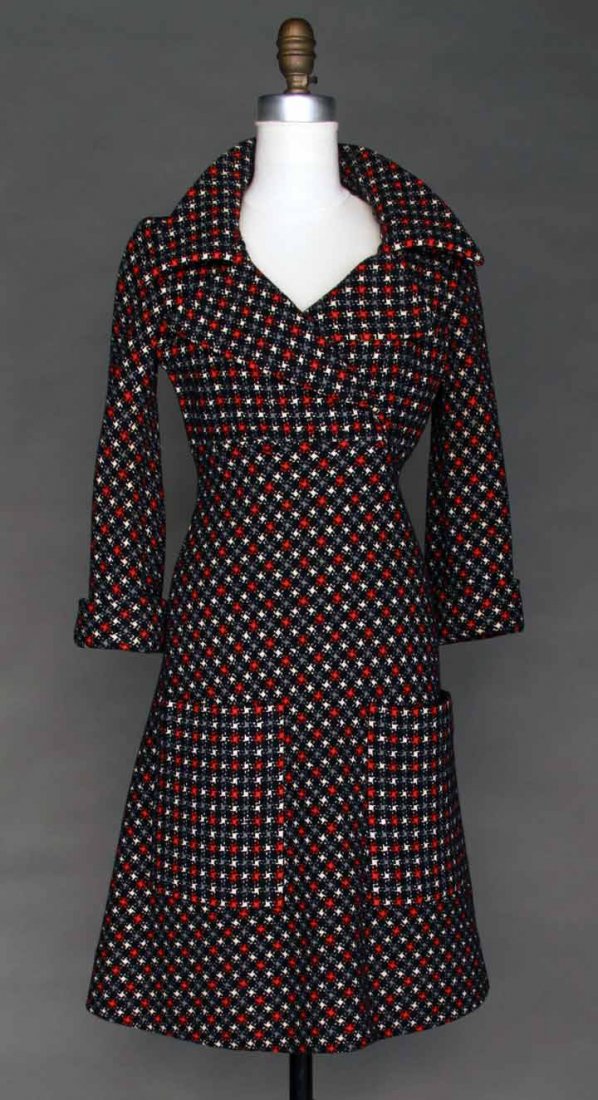PIERRE CARDIN WOOL DRESS, 1970s: Unlabeled, small scale houndstooth in black, red & white, empire, rever collar, 2 large patch pockets, B 34", L 39", excellent. Bought at Pierre Cardin, Paris. Provenance: Mme. Erna de Paz, Argentine 