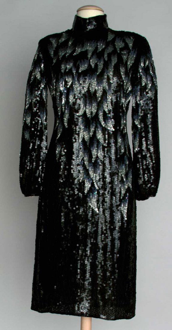 HALSTON SEQUIN EVENING DRESS, 1970s: Black silk completely covered w/ black & silver sequins in flame pattern, mid-calf length, B 38", W 32", L 44", excellent.