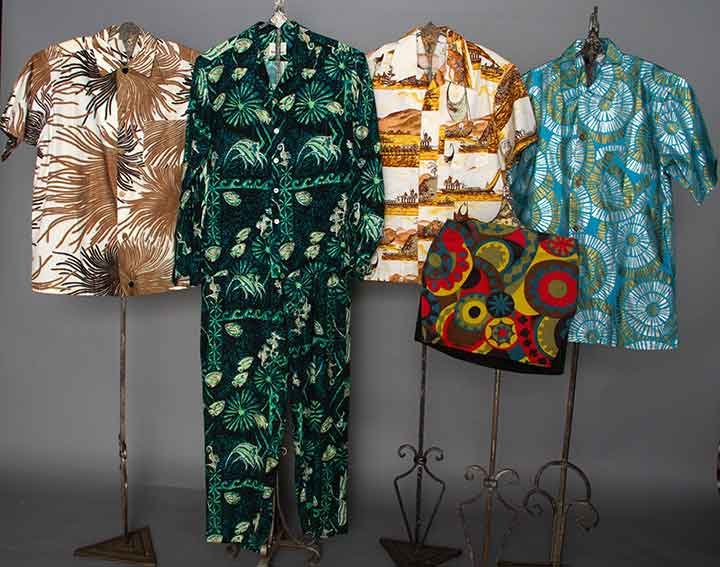 FIVE PIECES MEN'S RESORT WEAR, 1950-1970s: 1 deadstock pair black swim briefs w/ attached printed skirt, tag stamped "Brentwood Swim n' Play Shorts"; 1 rayon tropical-printed jacket & pant set; 3 printed cotton short sleeved shirts, all w/ Hon