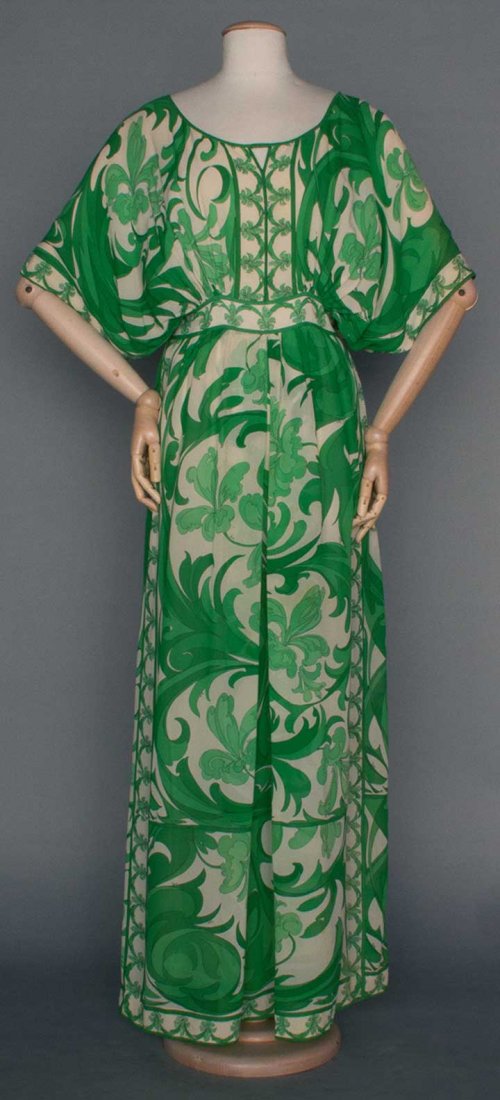 PUCCI PRINTED CHIFFON GOWN, 1970s: Flower & foliage print in emerald & grass green on white silk chiffon, floor length, blouson bodice w/ short batwing sleeves & low scoop neck, raised waistband, labeled, B OS, High W 30", L 58.5", (sc