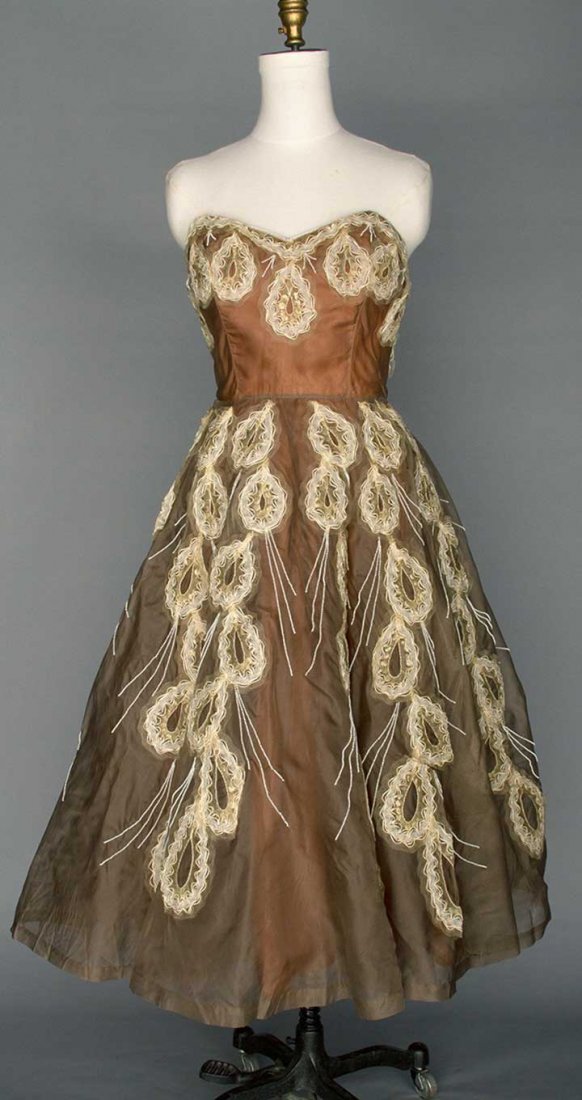 ORGANDY EVENING GOWN, ENGLAND, c. 1955: Taupe, strapless, trimmed in white beads & horsehair, straw & sequined teardrop elements, labeled "Harrods London", B 38", W 27", CF L 43", excellent.