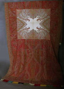 WOOL KASHMIRI SHAWL, 19TH C: Twill weave, rectangular w/ white center & elongated paisley motifs at both ends in turquoise, red & mustard, 54" x 124", (1 pea sized hole, several small moth holes) very good.