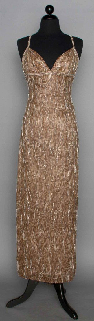 BOB MACKIE BEADED SILK EVENING GOWN, c. 1990: Tiger-printed chiffon in shades of brown, white bugle bead embroidery, bra-like bodice, beaded criss-cross spaghetti straps, taupe satin lining, labeled, B 34", W 24", L 55", (very small skirt hole, m