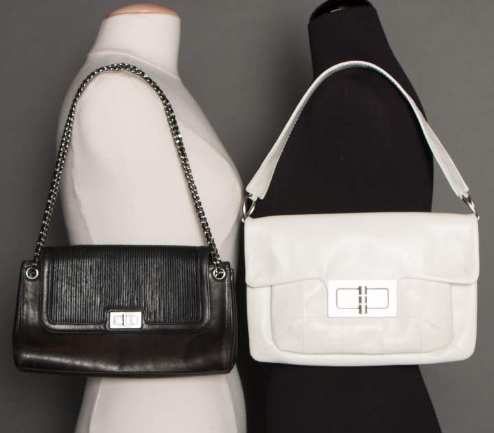 TWO CHANEL LEATHER HANDBAGS, c. 2000: 1 white envelope, brushed silver hardware stamped Chanel, quilted outer pocket, 1 interior zipper pocket, short leather handle, 11.5" x 8", Handle L 20", certificates of authenticity included, never u