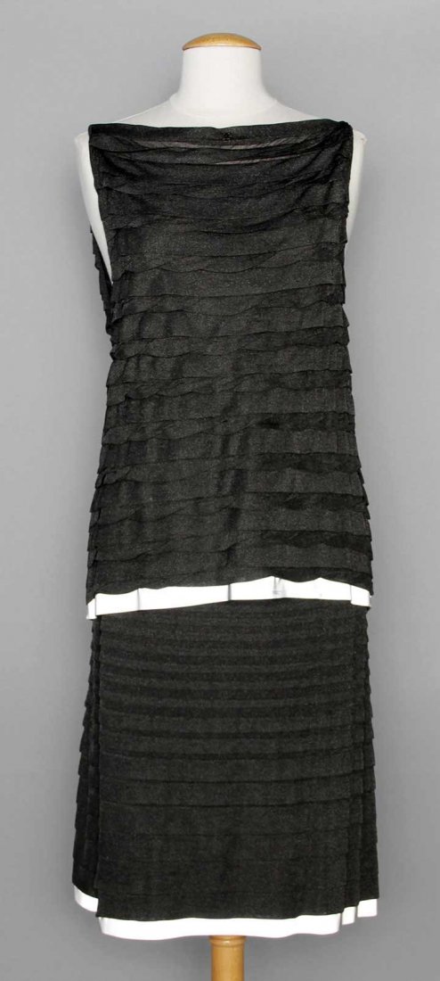 CHANEL M SZ DINNER DRESS, 2000s: 2-piece, charcoal gray rayon & nylon knit irridescent jersey in horizontal folds, sleeveless top & skirt, silver hemband on both pieces, labeled, top marked French size 44 (US 10) & skirt marked Frenc