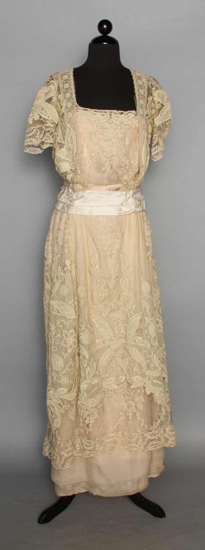 LACE & DRAGONFLY TEA GOWN, c. 1912: 2-piece, bone colored fine cotton lawn lavishly embroidered w/ dragonflies & scrolling foliage, inserts of embroidered net lace, bone chiffon over China silk lining, B 36", Top W 28", Skirt W 26.5", S