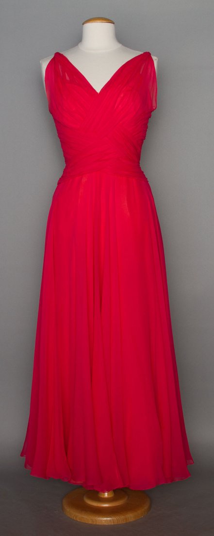 HELEN ROSE EVENING GOWN, 1948-1955: Coral silk chiffon, bodice w/ basket-woven pleated bands, V front & back, floating chiffon panels at CB, 2 layers of coral chiffon over layer of lemon yellow chiffon & yellow China silk lining, labele
