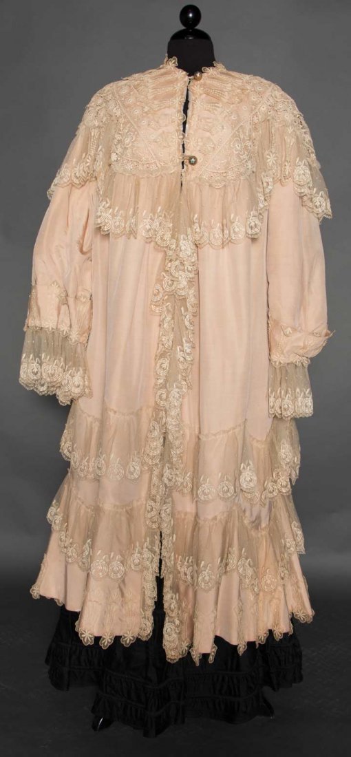 EDWARDIAN SILK OPERA COAT: Beige faille w/ lace & embroidered tulle capelet, lace flounces at CF opening, hem & cuffs, balloon sleeves, 2 enameled brass ball buttons, L 49", (large light stain on R sleeve & few tiny holes, whit