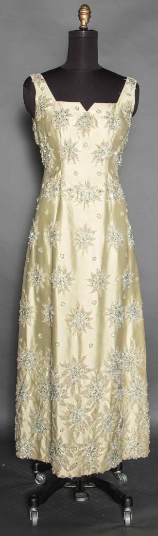 RODRIGUEZ EVENING ENSEMBLE, MADRID, 1960s: Pale green silk twill sleeveless gown, embellished in crystal & green glass starbursts, matching coat, both labeled "Pedro Rodriguez, Madrid, Barcelona-S. Sebastian", B 36", W 26", H 36", L 54", (smal