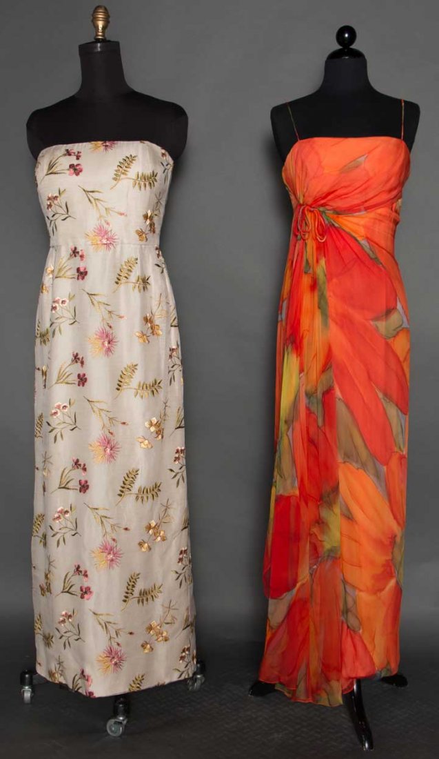 TWO SUMMER EVENING GOWNS, 1960s: Both silk sheaths: 1 "Bill Blass", strapless white w/ embroidered scattered florals in pink & mauve, B 38", W 34", H 43", CFL 51"; 1 unlabeled chiffon w/ large painterly blossoms in orange & yellow, e