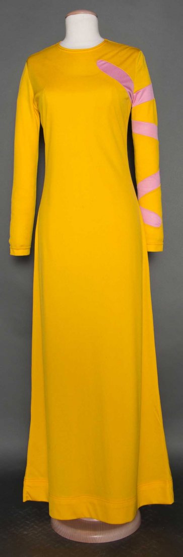 RUDI GERNREICH KNIT MAXI DRESS, 1970s: School bus yellow w/ pink band inserts, B 34"-36", H 36"-38", L 58", (tiny stain on right arm, faint stain back W area) very good. Museum De-Accession.