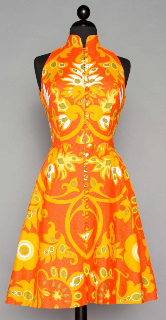GEOFFREY BEENE ORANGE PRINT DRESS, 1970: Cotton pique, sleeveless w/ cut in shoulders, mandarin collar, CF covered buttons, labeled, B 36", W 26.5", L 38", excellent.