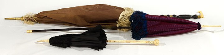 THREE SILK CANOPY PARASOLS, 1820-1870: 1 rare c. 1820 turned wood stick w/ repousee brass rings & bone hook, long brass canopy tip, whalebone ribs, brown silk pagota shaped canopy & cream silk fringe, L 37", (4 of 8 ribs detached from ends