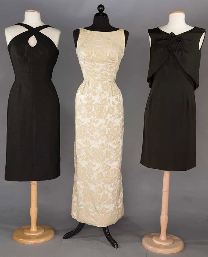 ONE EVENING ENSEMBLE & TWO COCKTAIL DRESSES, 1960s: 1 "Malcolm Starr" full length bone brocade, B 36", W 25", H 34", L 58", (tiny spot to skirt); 2 "Estevez" black silk cocktail: 1 w/ criss-cross bodice straps, B to 38", W 27.5", H 39", L 45" & 1 w/ ro