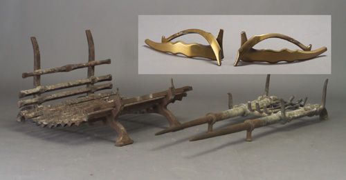 ALBERT PALEY Two steel fire dog frames, one with: ALBERT PALEY Two steel fire dog frames, one with forged and fabricated bronze finials with polished brass finish. 25" x 45" x 41" and 13" x 21" x 66"