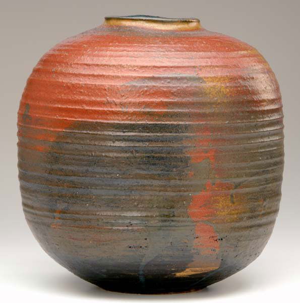 TOSHIKO TAKAEZU Ridged stoneware vessel in mahogan: TOSHIKO TAKAEZU Ridged stoneware vessel in mahogany, brown and amber matte glaze, 1965. Signed 1965/Toshiko TAKAEZU/$65.00. 11" x 10 1/2"