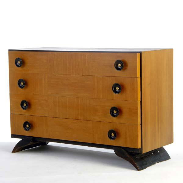 GILBERT ROHDE / HERMAN MILLER Walnut and ash four: GILBERT ROHDE / HERMAN MILLER Walnut and ash four-drawer chest with brass and ebonized wood pulls. Herman Miller label. 32 3/4" x 48" x 20 1/2"